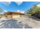 Attached garage with large concrete driveway at 2119 Zipperer Rd, Bradenton, FL 34212