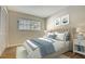 Serene bedroom featuring wood floors and stylish bedding at 2133 Oriole Dr, Sarasota, FL 34239