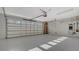 Spacious garage with overhead storage and epoxy floor at 2133 Oriole Dr, Sarasota, FL 34239