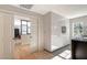 Modern kitchen with white cabinets and a view into another room at 2133 Oriole Dr, Sarasota, FL 34239