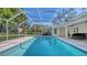 Inviting screened pool with ample deck space at 2133 Oriole Dr, Sarasota, FL 34239