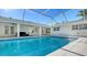 Inviting screened pool with ample deck space at 2133 Oriole Dr, Sarasota, FL 34239