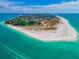 Aerial view of a beautiful island with white sand beach and turquoise water at 238 Oak Ave, Anna Maria, FL 34216