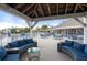 Relaxing community deck with seating, tables, and a view of the pool at 30 Tidy Island Blvd, Bradenton, FL 34210