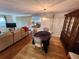 Dining area with wood floors and a wooden hutch at 308 Danube Cir, Bradenton, FL 34207