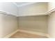 Large walk-in closet with ample shelving at 3123 Founders Club Dr, Sarasota, FL 34240