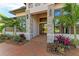 Elegant entryway with stone accents and double doors at 3123 Founders Club Dr, Sarasota, FL 34240