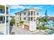 Three-story house with balconies and attached garage, near beach at 317 Beach Rd, Sarasota, FL 34242