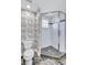 Clean bathroom with a walk-in shower and stylish tile work at 317 Beach Rd, Sarasota, FL 34242