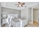 Guest bedroom with a queen-size bed and ample closet space at 317 Beach Rd, Sarasota, FL 34242