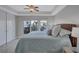 Bright bedroom with a king-size bed and plenty of closet space at 317 Beach Rd, Sarasota, FL 34242