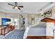 Spacious main bedroom with large windows, a TV, and a sitting area at 317 Beach Rd, Sarasota, FL 34242