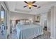 Relaxing bedroom with a king-size bed and direct access to balcony at 317 Beach Rd, Sarasota, FL 34242