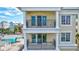 Two-story building with multiple balconies and columns at 317 Beach Rd, Sarasota, FL 34242