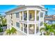 Three-story home with balconies and a beautiful exterior at 317 Beach Rd, Sarasota, FL 34242