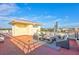 Large rooftop deck with lounge chairs and city views at 317 Beach Rd, Sarasota, FL 34242