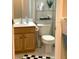 Well-maintained bathroom featuring vanity, tiled floor, and shower at 3453 Parkridge Cir # 18-101, Sarasota, FL 34243