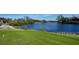 Immaculately landscaped golf course with water views at 3598 Fair Oaks Ln, Longboat Key, FL 34228