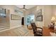 Spacious home office with hardwood floors and built-in desk at 3598 Fair Oaks Ln, Longboat Key, FL 34228