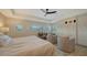 Bright and airy main bedroom with built-in storage at 3598 Fair Oaks Ln, Longboat Key, FL 34228