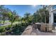 Relaxing patio area with outdoor seating and water views at 3598 Fair Oaks Ln, Longboat Key, FL 34228