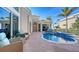 Inviting pool area with brick pavers and patio furniture at 3598 Fair Oaks Ln, Longboat Key, FL 34228