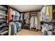 Spacious walk-in closet with ample shelving and hanging space at 3598 Fair Oaks Ln, Longboat Key, FL 34228