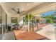 Expansive deck with seating area and access to the pool and backyard at 3709 Beneva Oaks Way, Sarasota, FL 34238