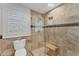 Clean bathroom with a walk-in shower and toilet at 3709 Beneva Oaks Way, Sarasota, FL 34238