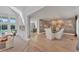 Formal dining room with hardwood floors, stylish light fixture and scenic wallcovering at 3709 Beneva Oaks Way, Sarasota, FL 34238