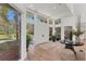 Spacious entryway with light hardwood floors and natural light at 3709 Beneva Oaks Way, Sarasota, FL 34238