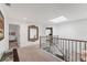 Bright hallway with skylight and ornate mirror at 3709 Beneva Oaks Way, Sarasota, FL 34238