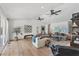 Light-filled living room showcasing hardwood floors and ample natural light at 3709 Beneva Oaks Way, Sarasota, FL 34238