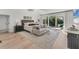 Luxurious main bedroom with sitting area and access to backyard oasis at 3709 Beneva Oaks Way, Sarasota, FL 34238