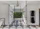 Spa-like shower with marble walls, glass enclosure, and a built-in bench at 3709 Beneva Oaks Way, Sarasota, FL 34238