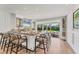 Modern wet bar with a stunning backsplash, wine storage, and ample counter space at 3709 Beneva Oaks Way, Sarasota, FL 34238