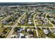 Expansive aerial view showing home and surrounding area at 372 Tihami Rd, Venice, FL 34293