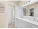 Elegant bathroom with double vanity and white subway tile at 372 Tihami Rd, Venice, FL 34293