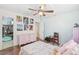 Bedroom with light pink dresser and walk-in closet at 372 Tihami Rd, Venice, FL 34293