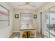 Kitchen dining area with light teal table and four chairs at 372 Tihami Rd, Venice, FL 34293