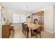 Dining room with a long wooden table and hutch at 372 Tihami Rd, Venice, FL 34293