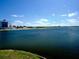 Expansive waterfront view with blue waters, sky and view of the facilities at Nathan Benderson Park at 3822 Ironwood Ct, Sarasota, FL 34243