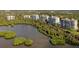 Luxury condos nestled on the waterfront with beautiful landscaping at 401 N Point Rd # 401, Osprey, FL 34229