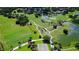 Aerial view of lush golf course with ponds and homes at 401 N Point Rd # 401, Osprey, FL 34229