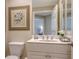 Small bathroom with toilet and vanity at 401 N Point Rd # 401, Osprey, FL 34229