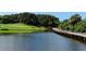 Wooden bridge over water on golf course at 401 N Point Rd # 401, Osprey, FL 34229