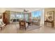 Living room with view and access to balcony at 401 N Point Rd # 401, Osprey, FL 34229