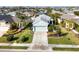 Aerial view of a single-Gathering home in a residential community with lush landscaping at 4121 Deep Creek Ter, Parrish, FL 34219