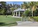 Community gazebo with picnic tables and bike rack, near playground at 4121 Deep Creek Ter, Parrish, FL 34219