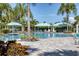 Relaxing resort-style pool with shaded seating and lounge chairs at 4121 Deep Creek Ter, Parrish, FL 34219